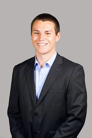 CJ headshot_11_lighterBgkrd_retouchedFullRes